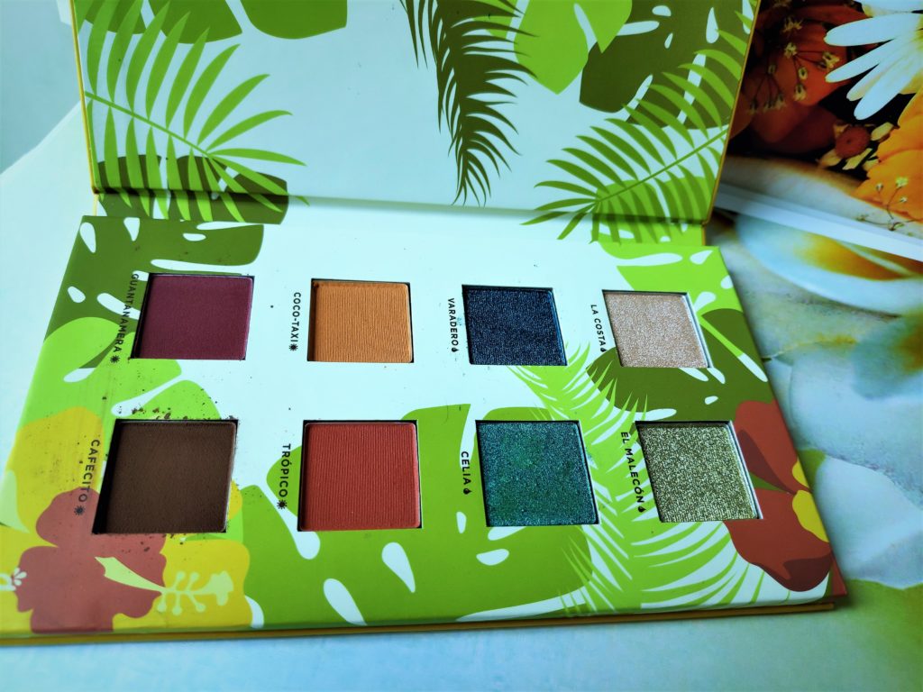 The Alamar Cosmetics Reina Del Caribe  palette features eight eye shadows in warm and cool tones. There are four mattes and four shimmery metallic shadows.