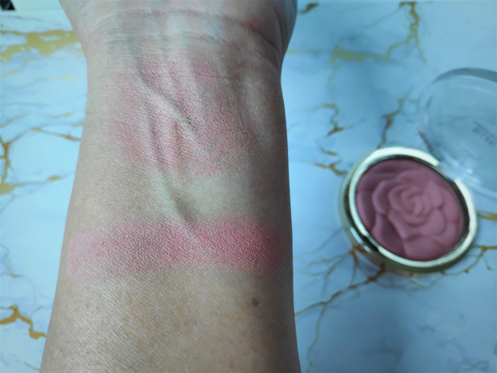 Milani Rose Powder blush is a  soft, natural-finish powder that shapes, contours and highlights with flattering matte and shimmery shades made to complement every skin tone. The swatch is on medium skin tone. 