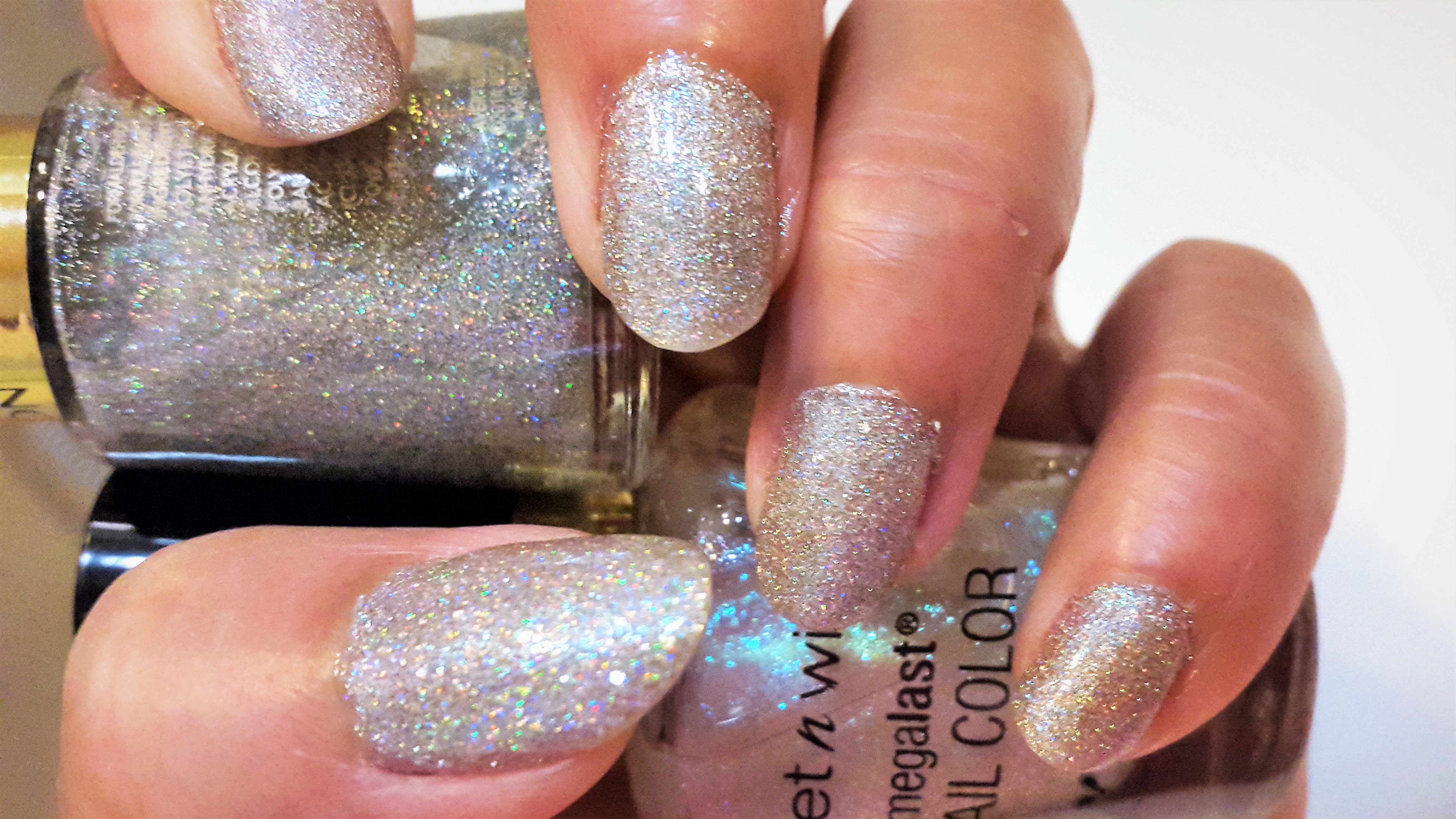 My favorite nail polishes for winter. Revlon 765 Holographic Pearls.