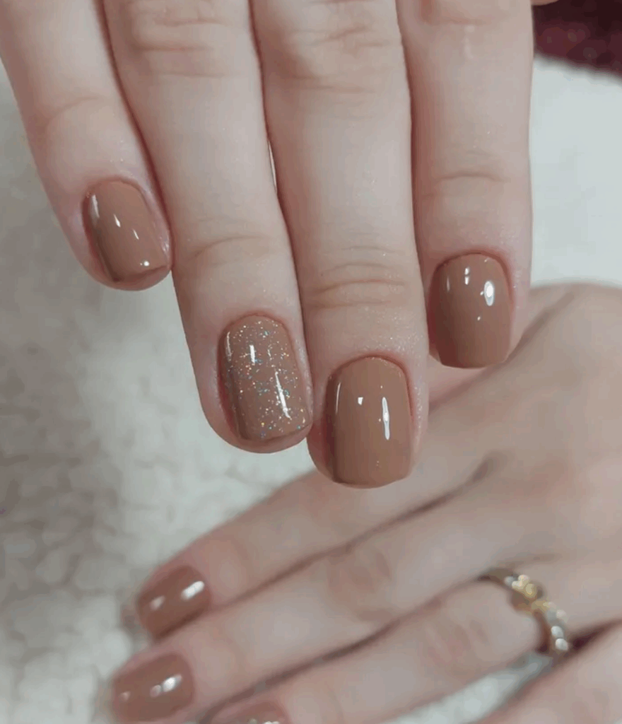 Shades of brown is one of the most trending and chic fall nail colors in 2025