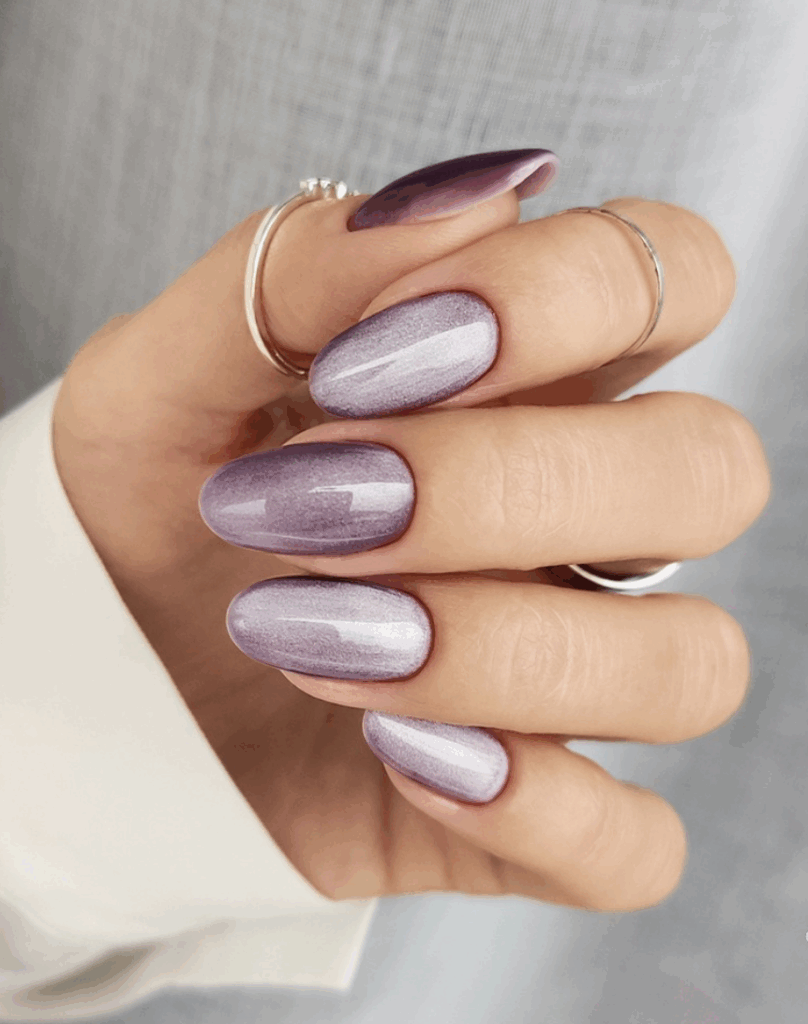 Chrome nails or glass nails in jewel tones are the latest trends in fall 2025