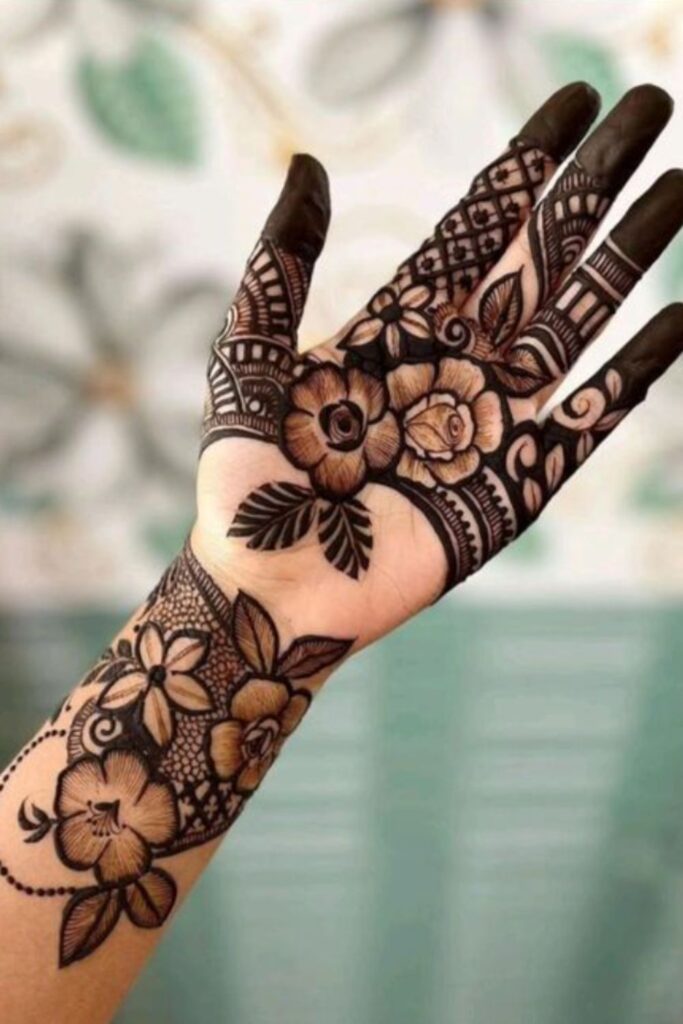 Floral mehndi design with roses and vines for festive look