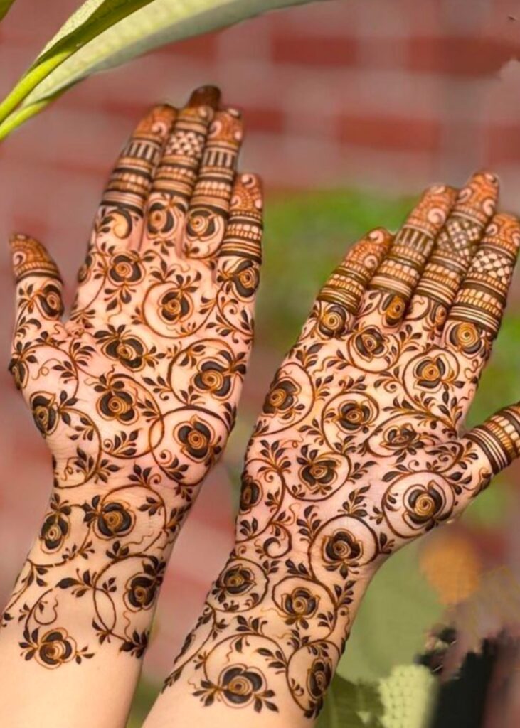Floral mehndi design with roses and vines for festive look