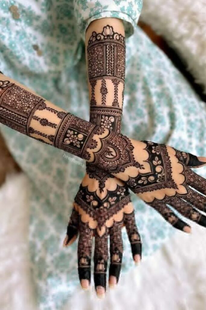 Eye-catching bridal mehndi design for full back arm