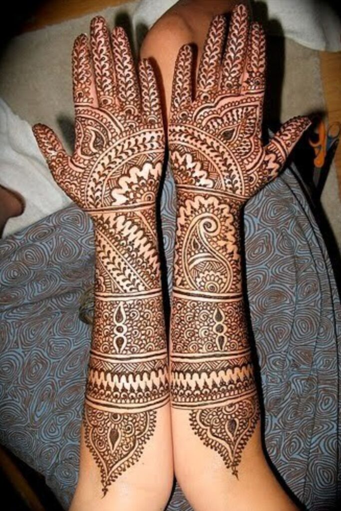 Heavy bridal mehndi design 2025 full hand with paisleys and mandala