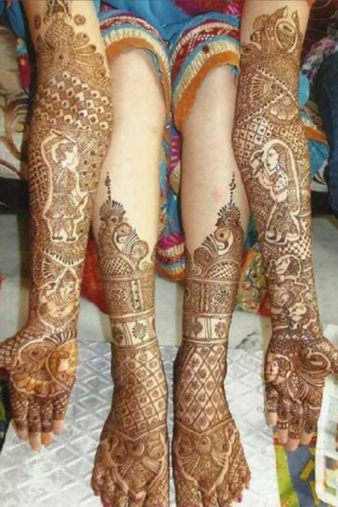 Full arm and knee length bridal mehndi design 2025 with bride groom and ganesh motifs