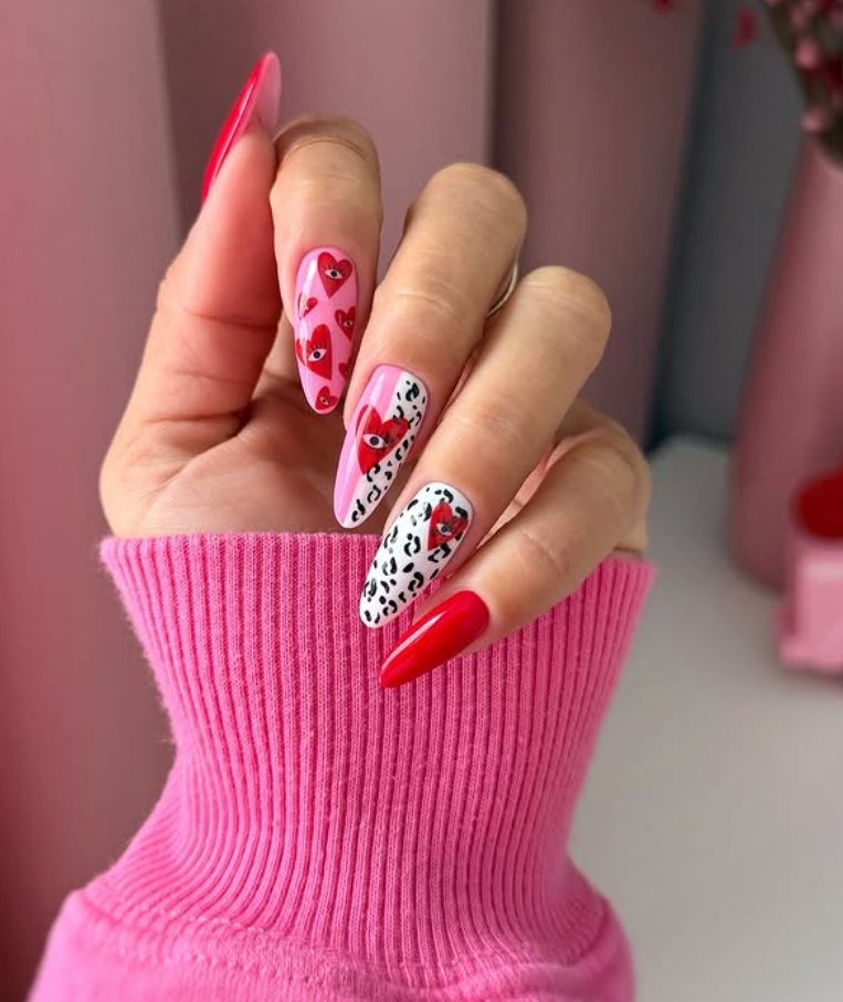 Red Valentine’s Day nails with heart design