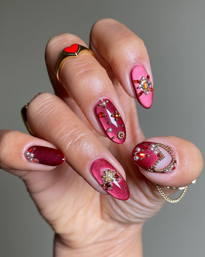 Red Valentine’s Day nails with heart design