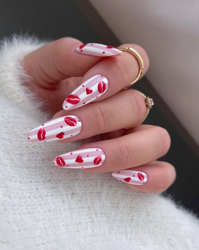 Red Valentine’s Day nails with heart design