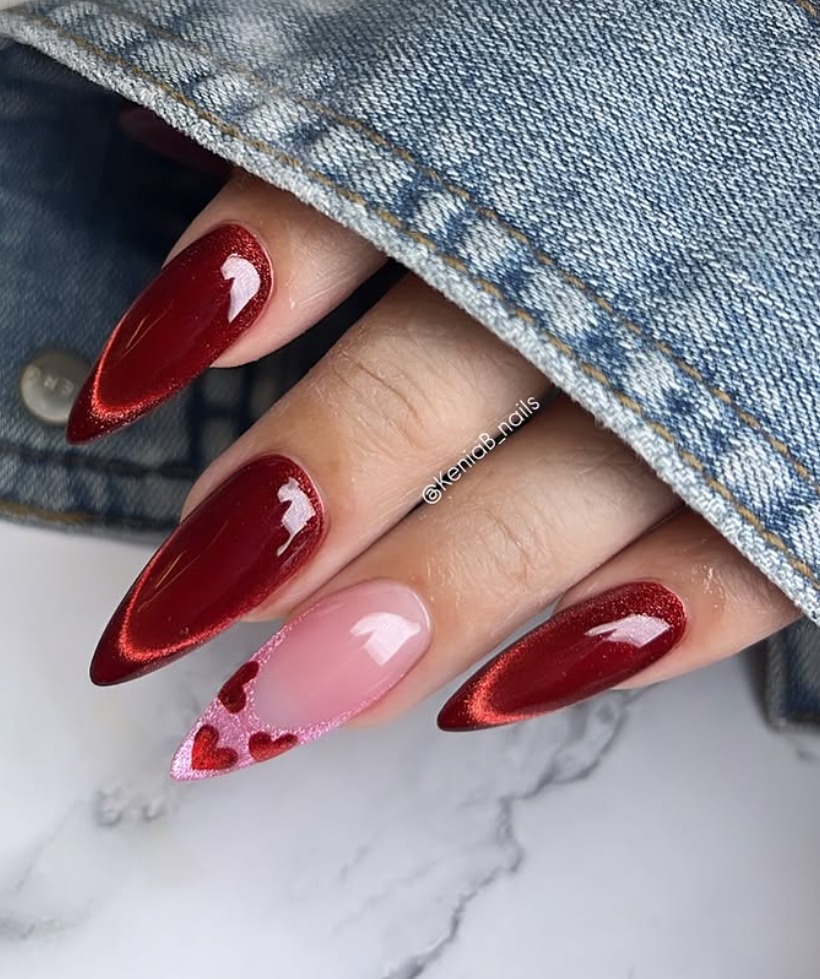 Red Valentine’s Day nails with heart design