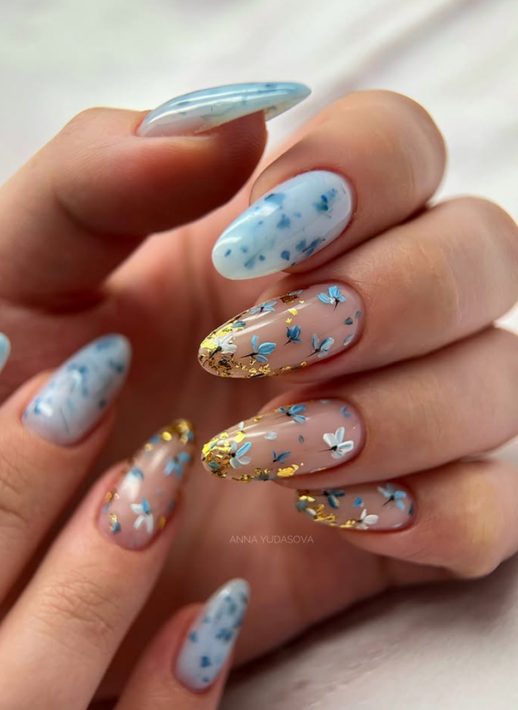 Neutral nails with fine hand painted flowers adorn your nails